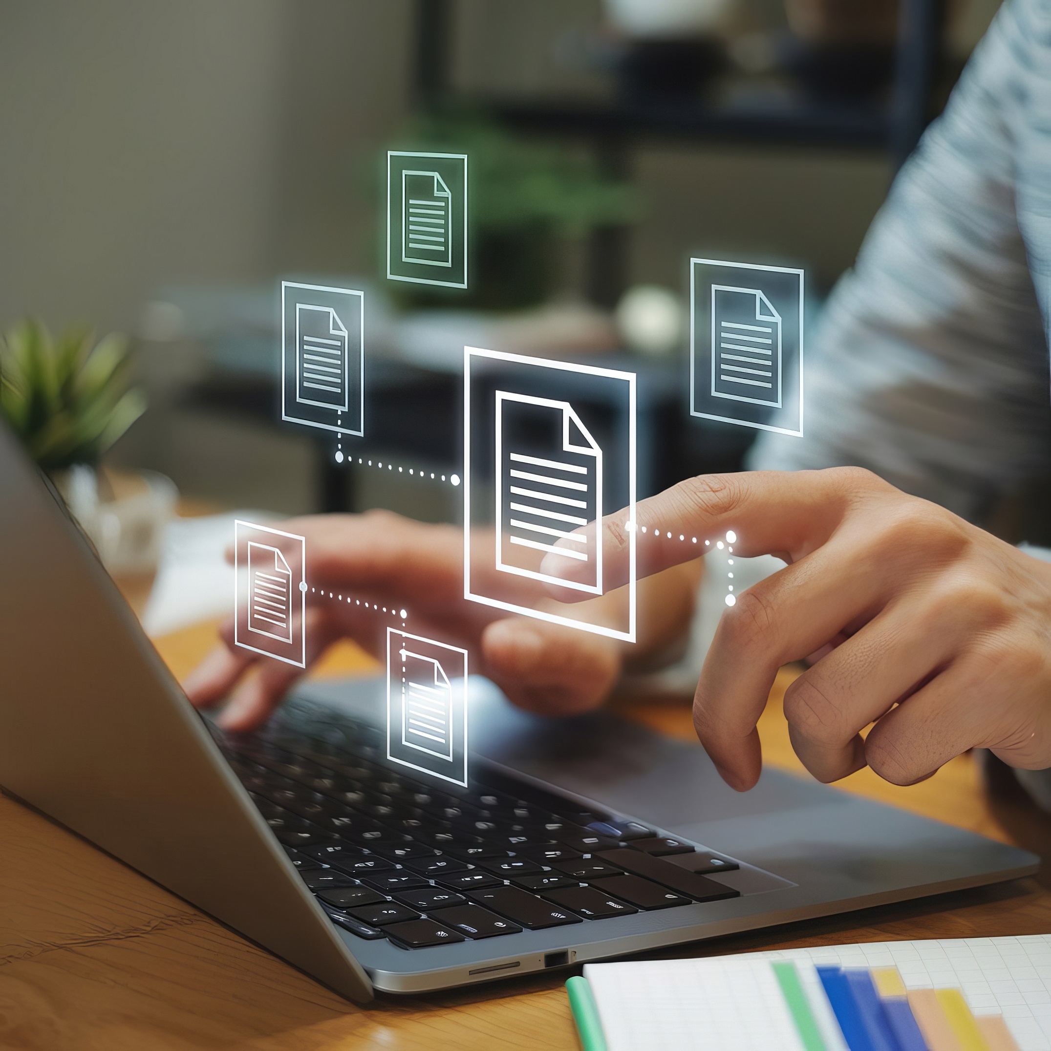 closeup hand laptop with floating holographic document icons